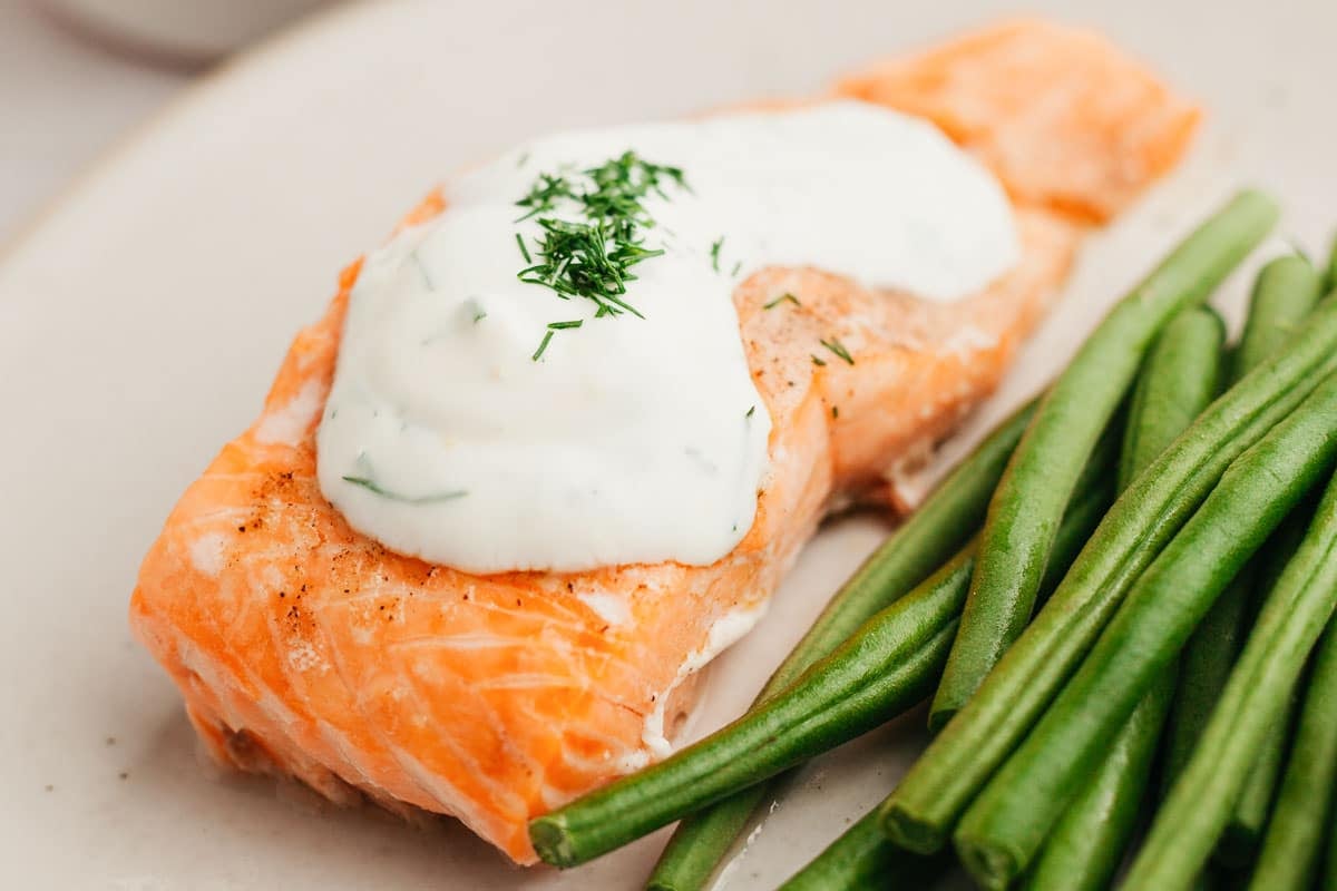 Effortless Oven-Baked Salmon with Luxurious Creamy Dill Sauce